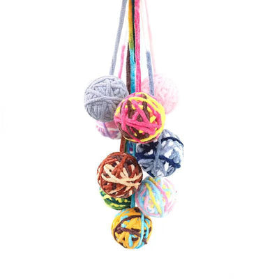 Colorful plush wool ball cat toys with long yarn tails, featuring various patterns and a bell inside for play. - Image 8
