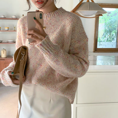 Suéter tejido melange vintage con cuello redondo