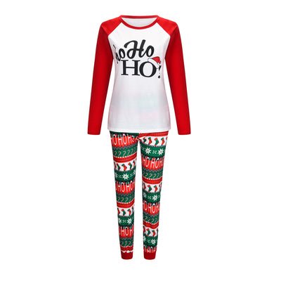 White and red Christmas pajama set with "Ho Ho HO!" text and fair isle patterned pants. - Image 11