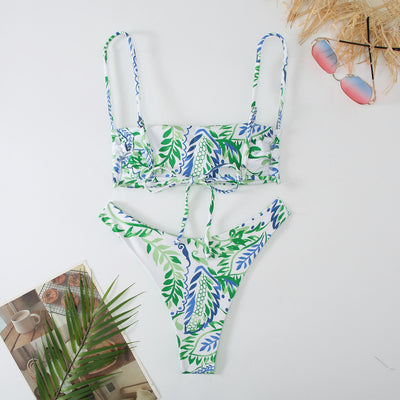 White ribbed two-piece swimsuit with pink and blue paisley floral print, bandeau top, and high-cut bottoms. - Image 12