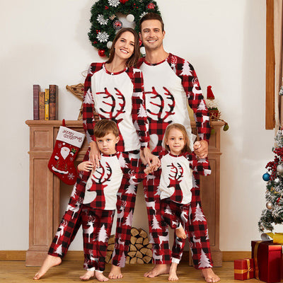 Women's Christmas pajama set with white raglan top featuring a red plaid deer head and matching red plaid pants with deer and trees. - Image 12