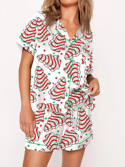 White short-sleeve pajama set with red and green Christmas tree and star print, featuring green piping. - Image 8