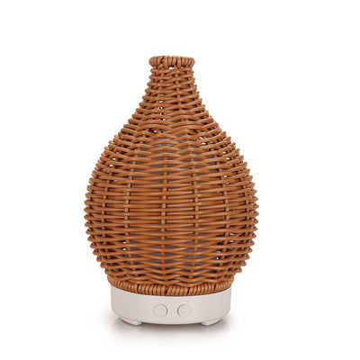 Mini ultrasonic aroma diffuser with a brown hollow rattan-style body and a white base, featuring control buttons. - Image 4