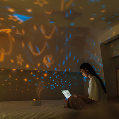 White USB star projector night light with a rotating dome, featuring a sleek design and a USB-C port. - Image 9
