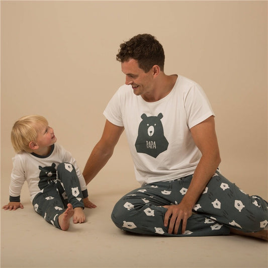 Father and son wearing matching white and dark gray bear-themed pajamas, featuring a 'PAPA' bear graphic. - Image 2