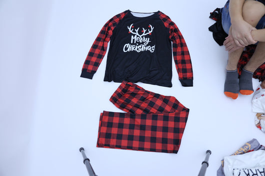 Black and red buffalo plaid pajama set with 'Merry Christmas' and reindeer antlers on the long-sleeved top. - Image 10