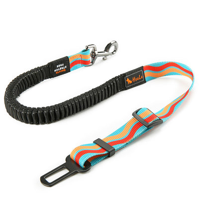 Red pet seat belt with reflective stitching, featuring a metal swivel clip and a black car seat belt buckle. - Image 42