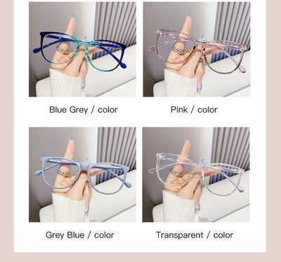 Black full-frame round anti-blue light glasses held by a hand with a gold ring and light blue gradient nails. - Image 17