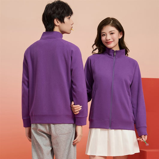 Purple full-zip jacket with a stand-up collar, raglan sleeves, and front pockets, displayed on a hanger. - Image 32