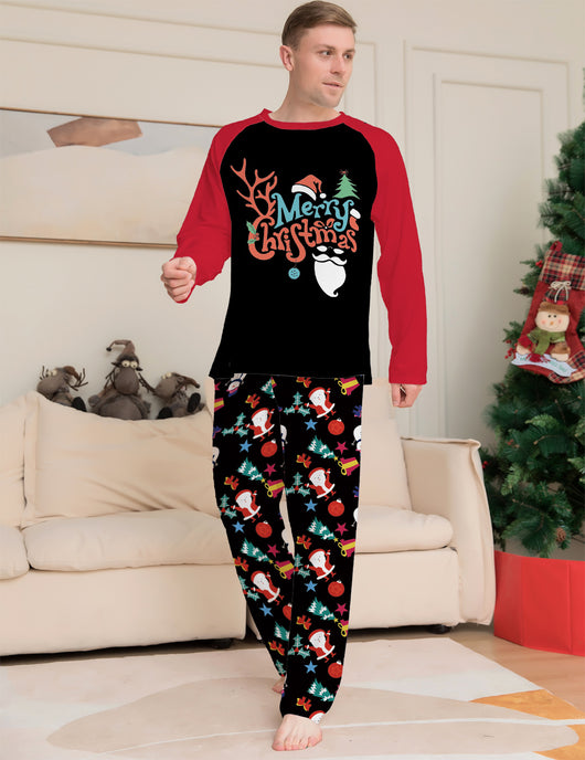 Man wearing a black and red long-sleeve Christmas pajama set with "Merry Christmas" graphic and Santa print pants. - Image 5