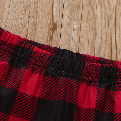 Family matching Christmas pajamas with red and black buffalo plaid pants and white long-sleeve tops featuring a deer graphic and "MERRY CHRISTMAS" text. Include - Image 8
