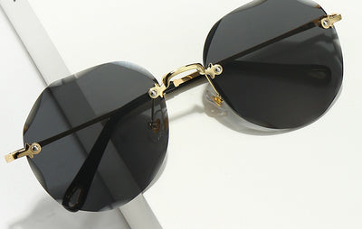 Gafas de Sol Poligonales para Mujer sin Montura con Detalles Metálicos - Image 15
