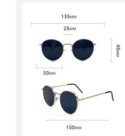 Round red lens sunglasses with a gold metal frame and black temple tips on a white background. - Image 13