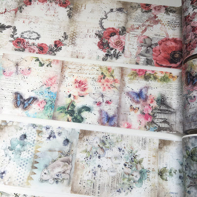 Two rolls of vintage floral washi tape with clocks, feathers, and text overlays, measuring 55mm x 5m.