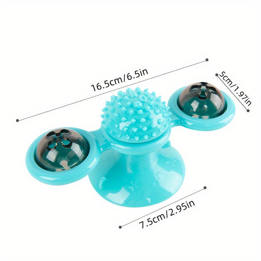 Gray tabby cat playing with a teal windmill cat toy featuring a suction cup base, textured ball, and colorful spinning paddles. - Image 9