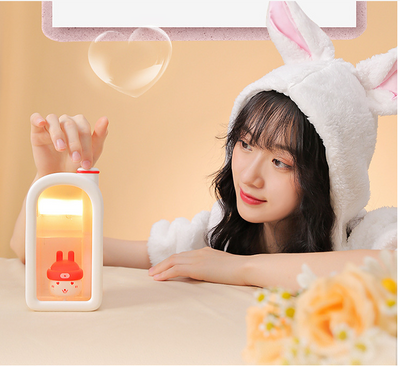 Pink automatic blind box rabbit night humidifier with a white rabbit figure inside, featuring a red hat and heart details. - Image 9