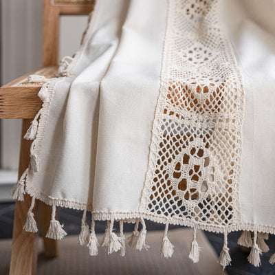 Beige crochet and plaid stitching short curtain with tassels, made from polyester cotton, hanging in a cozy room. - Image 4