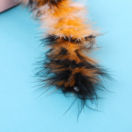 Long turkey feather cat toy with black, orange, and white stripes, featuring a small silver bell. - Image 9