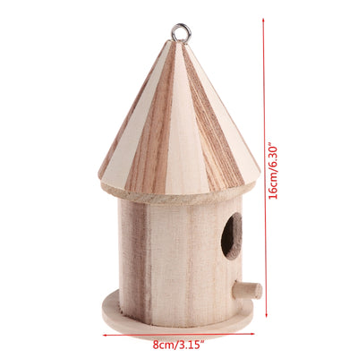 Wooden outdoor bird nest with a conical striped roof and a small entrance hole, next to a bird on a branch. - Image 7