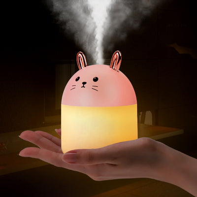 Cute sky blue and white mini USB rabbit humidifier with gold ears, ideal for home or office aromatherapy. - Image 3