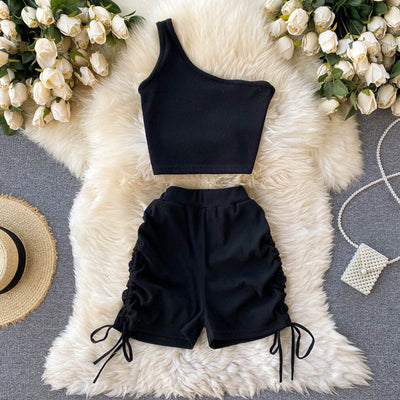 Conjunto Infantil Camiseta Asimétrica con Shorts Talle Alto Plisados - Image 9