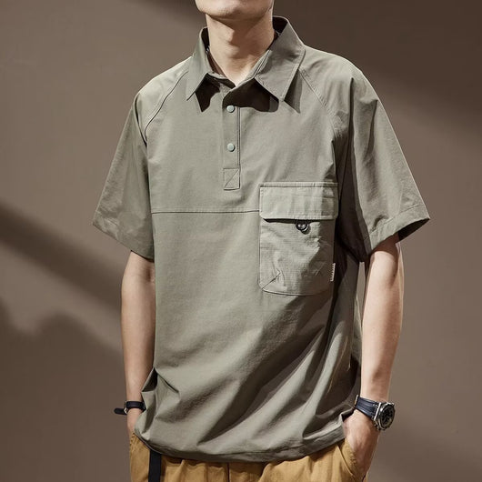 Men's khaki short-sleeve polo shirt with a lapel collar, three buttons, and a large flap chest pocket with a D-ring. - Image 6