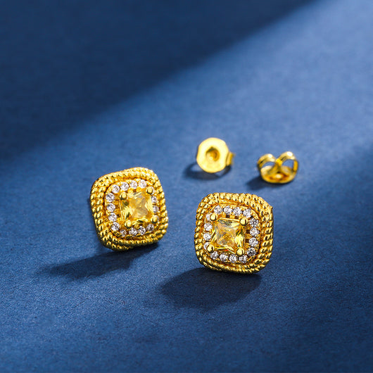 Women's gold-toned jewelry set with a ring, necklace, and stud earrings, each featuring a square yellow gemstone surrounded by small clear stones. - Image 3