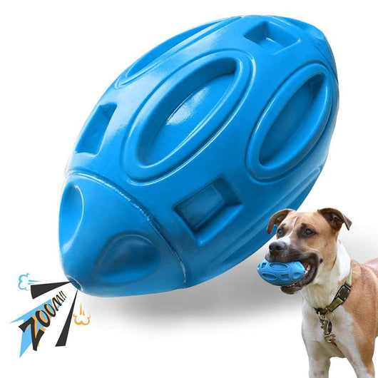 Green rubber rugby-shaped dog toy with textured surface and cut-outs, designed for chewing and play. - Image 10