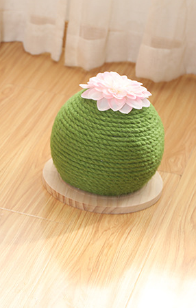 Green rope cat scratching toy shaped like a cactus with a pink flower on top, sitting on a light wood base. - Image 11