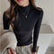 Blusa Base Cuello Semialto Manga Larga para Mujer