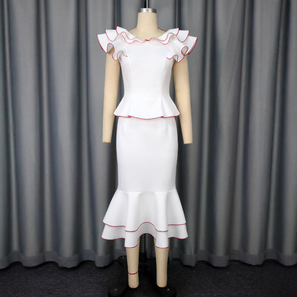 Conjunto Elegante: Blusa con Volantes y Falda Ajustada Efecto Sirena