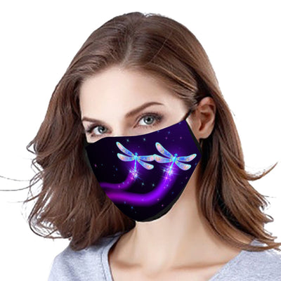Black cotton face mask with a glowing pink butterfly and blue abstract pattern, worn by a woman. - Image 14