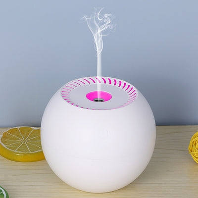 Dark wood grain spherical USB humidifier with a green light and mist emitting from the top, featuring a power button icon. - Image 5