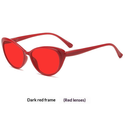 Retro cat-eye sunglasses with bright black frames and yellow night vision lenses on a white background. - Image 12