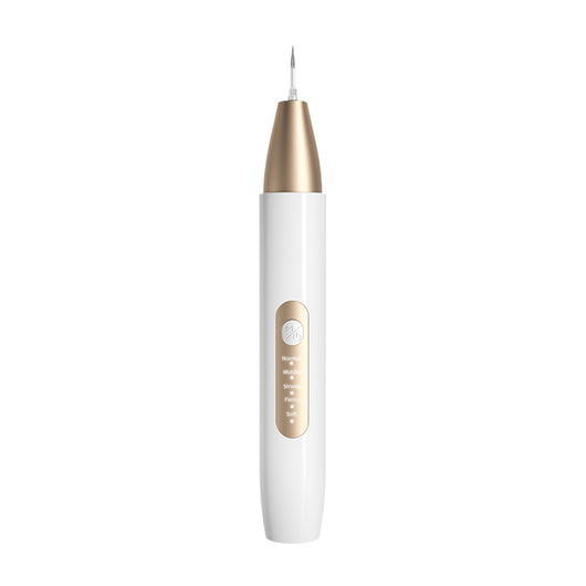 White and gold ultrasonic tooth cleaner with a pointed metal tip, standing in a white charging base. - Image 8