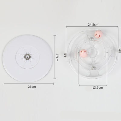 Clear plastic cat turntable toy with two pink balls inside, designed for interactive play and entertainment. - Image 9