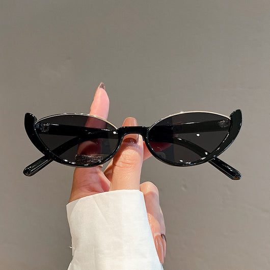 Pink cat-eye sunglasses with purple gradient lenses on a white background, showcasing a trendy style. - Image 6