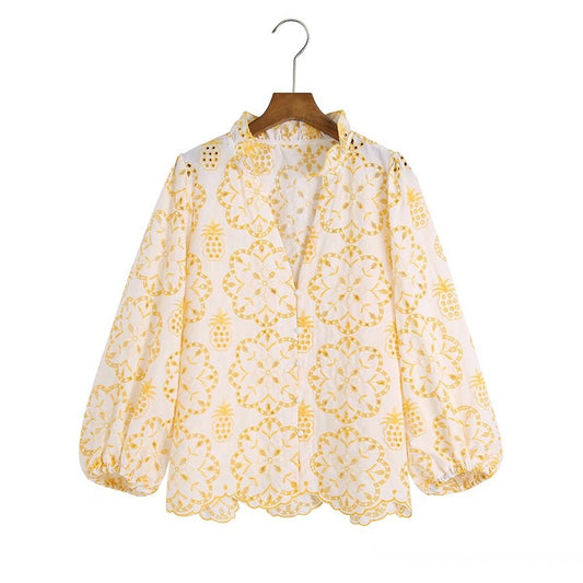Blusa Elegante con Mangas Abullonadas y Bordado Exclusivo