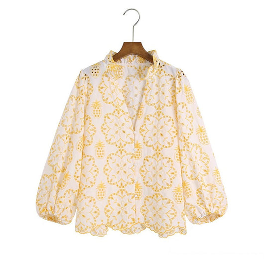 Blusa Elegante con Mangas Abullonadas y Bordado Exclusivo