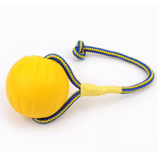 Yellow EVA pet training ball with a blue and yellow braided rope, suitable for dog play and training. - Image 2
