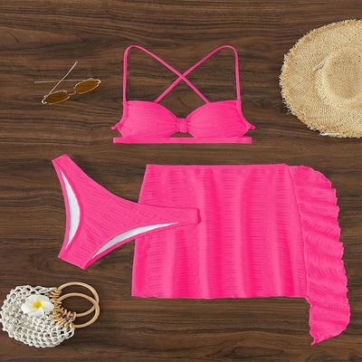 Hot pink lace-up bikini three-piece swimsuit with textured fabric and ruffled sheer cover-up skirt. - Image 7