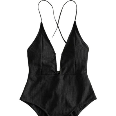 Olive green ribbed one-piece swimsuit with deep V-neck and criss-cross back straps, laid flat on marble. - Image 3