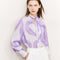 Blusa Primaveral con Estampado de Cintas y Graffiti para Mujer