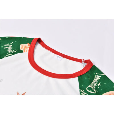 Green baby Christmas pajama romper with red trim, featuring candy canes, ornaments, gingerbread men, and poinsettias. - Image 15