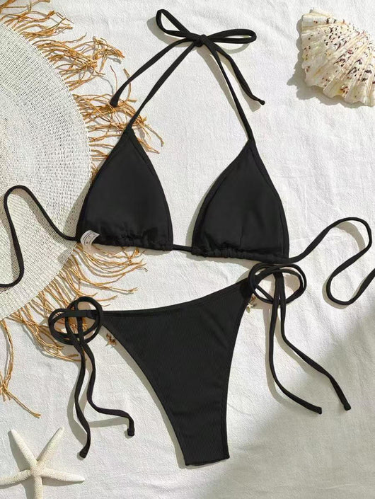 Light pink ribbed halterneck bikini with triangle cups and tie-side bottom, adorned with shell and starfish charms. - Image 22