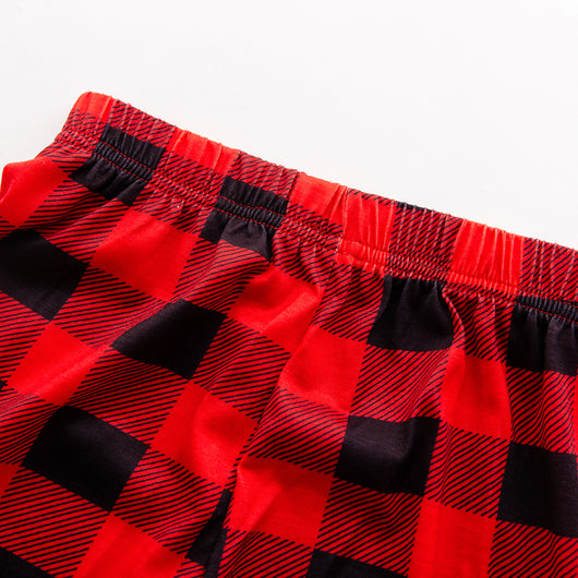 Red and black buffalo plaid Christmas pajama set with a long-sleeve top and matching pants. Top reads "2023 FAMILY Christmas". - Image 10