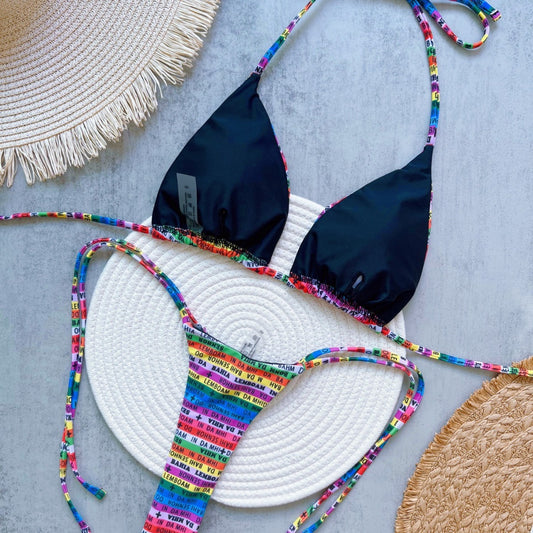 Women's multicolor letter printed lace-up bikini suit with triangle top and thong bottom, displayed on a white mat. - Image 2