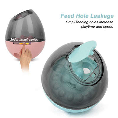 Orange and blue interactive pet food dispenser toy with multiple tiers and white balls, next to its black packaging. - Image 10
