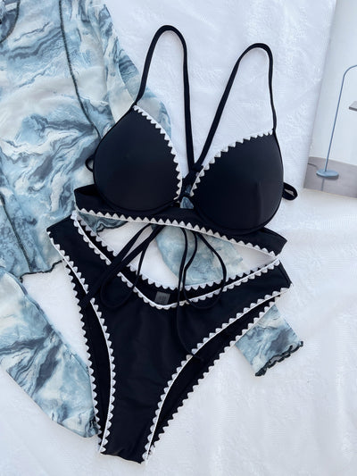 Women's black bikini swimsuit with white scalloped trim, featuring a push-up top and high-cut bottom. - Image 2