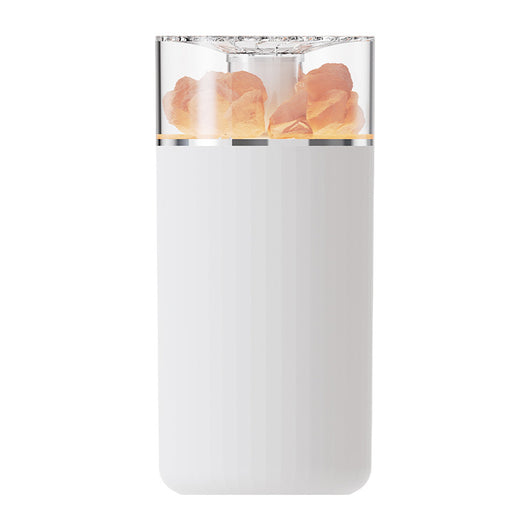White portable aromatherapy humidifier with a clear top section displaying glowing pink salt crystals and a silver band. - Image 4